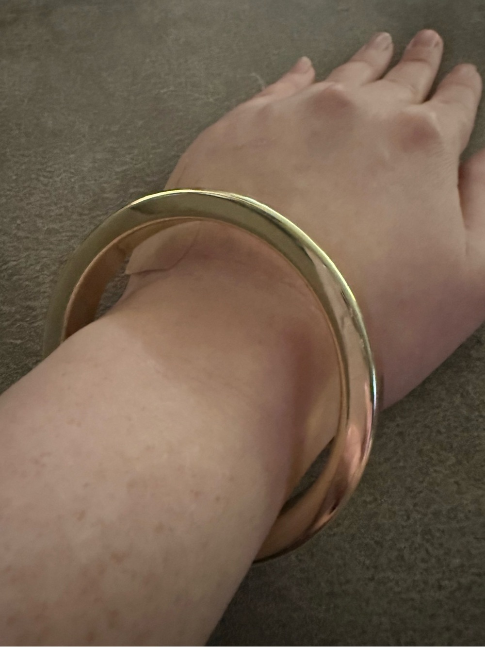 Polished Gold Tone Round Bangle Bracelet